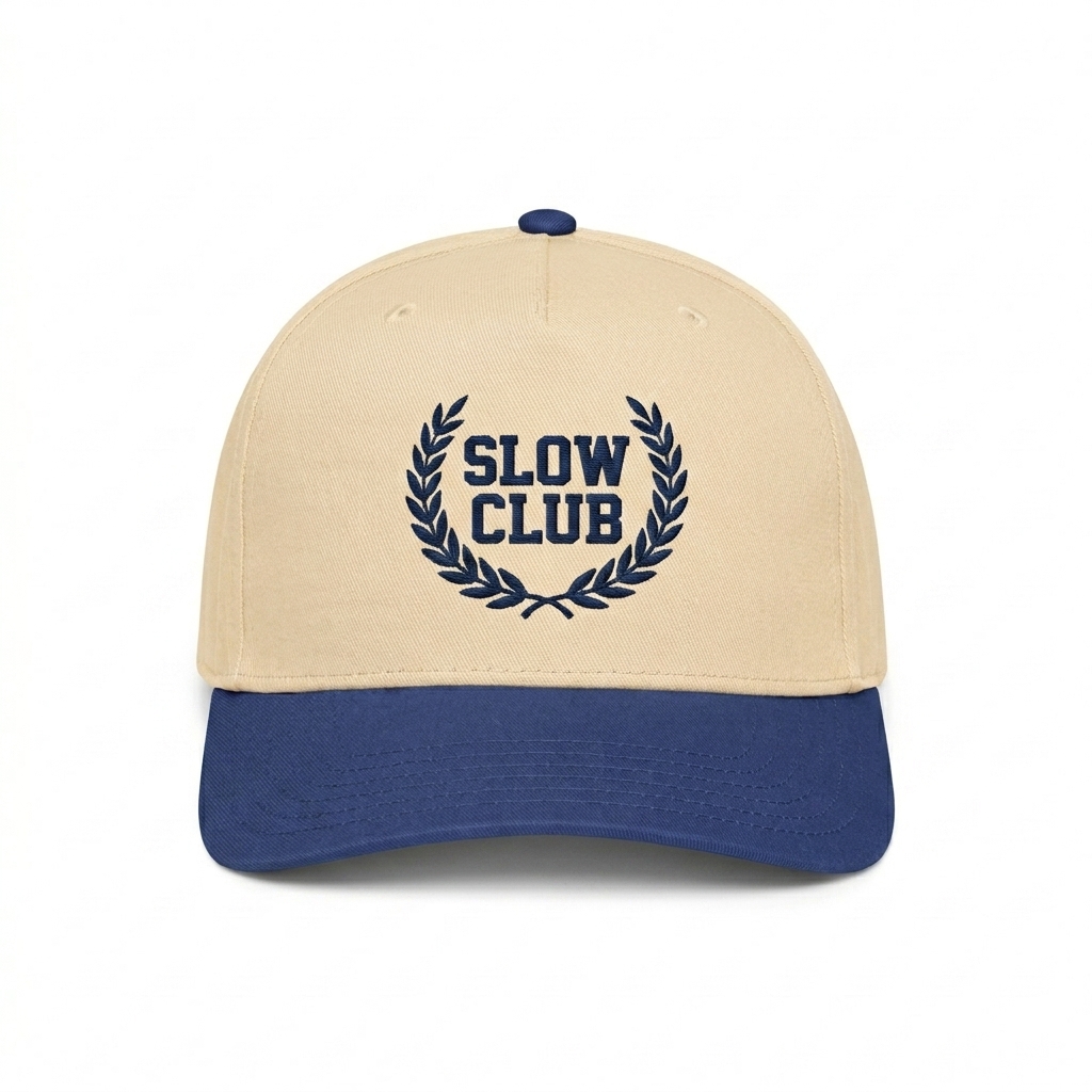 Custom 5-Panel Mid-Profile Baseball Cap design direction 3: Retro Collegiate Emblem featuring the SLOW CLUB wordmark