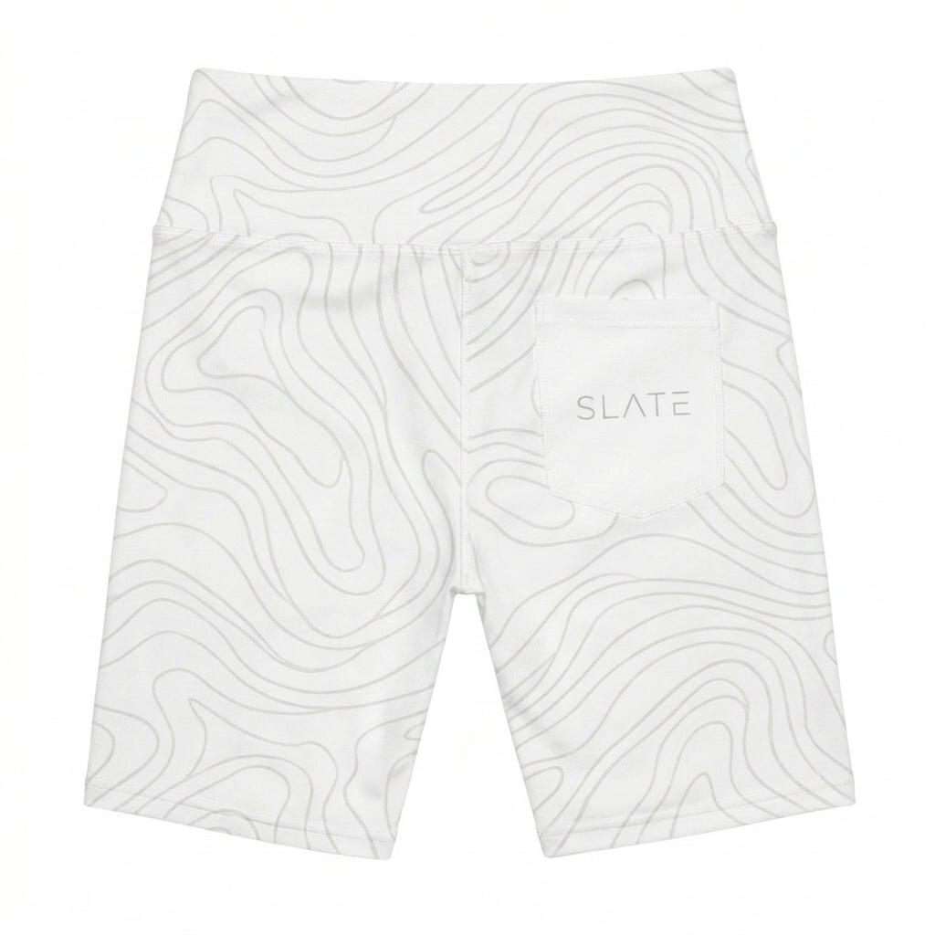 Custom All-Over Print Biker Shorts design direction 1: Tonal Abstract Flow featuring the SLATE wordmark