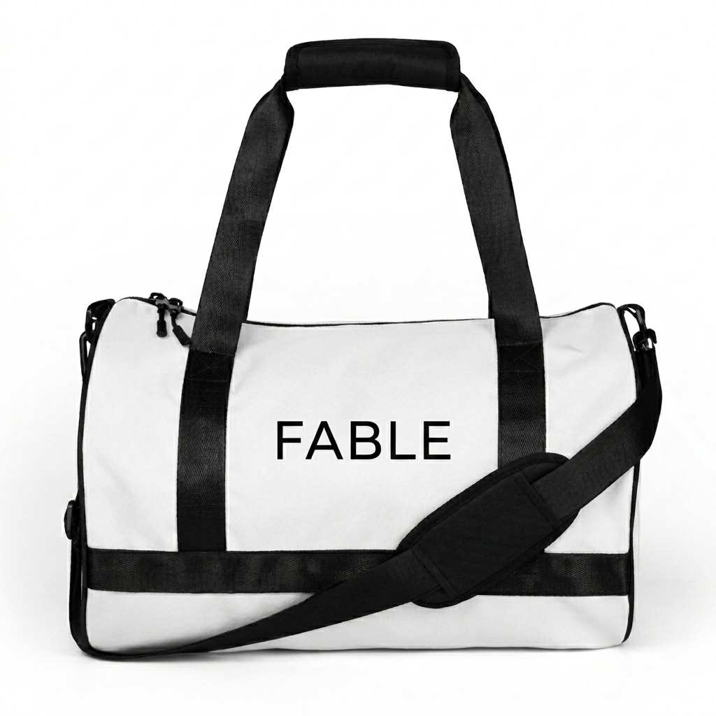 Custom All-Over Print Gym Bag design direction 2: Vibrant Botanical Illustration featuring the FABLE wordmark