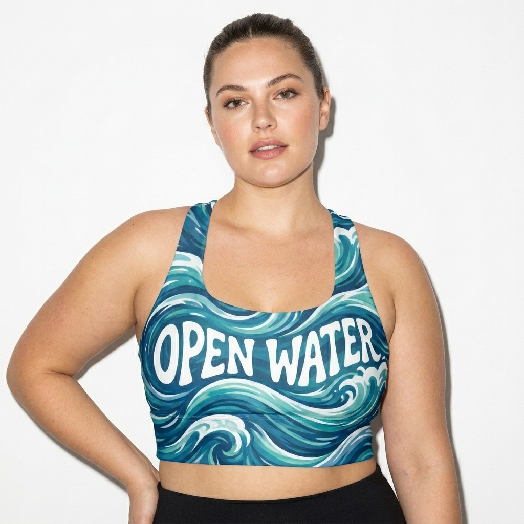 All-Over Print Longline Sports Bra worn by a curvy White American female fashion influencer, preppy ivy styling, studio lookbook — custom all-over print longline sports bra