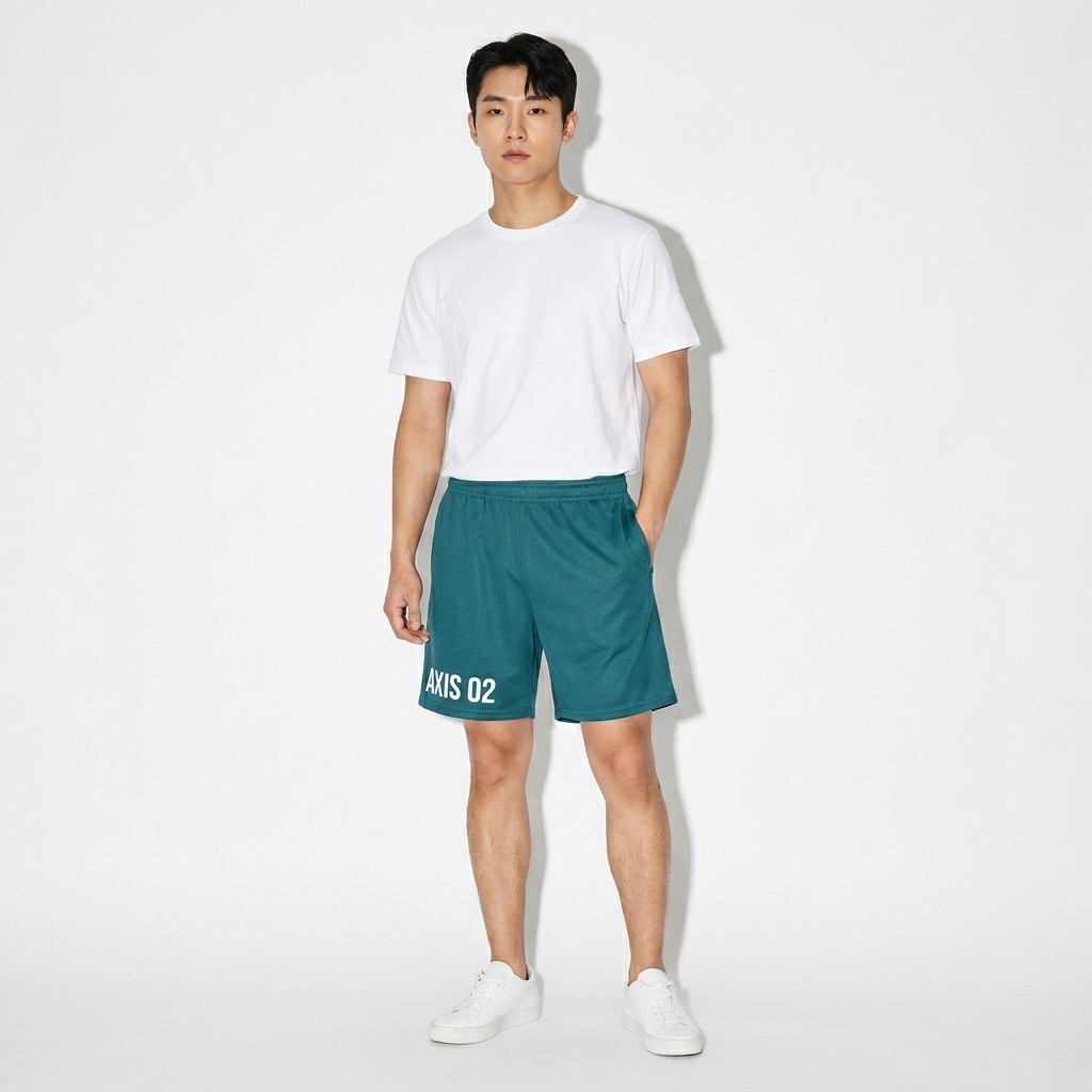 All-Over Print Recycled Mesh Shorts worn by a petite Korean male fashion influencer, minimalist luxury styling, studio lookbook — custom all-over print recycled mesh shorts