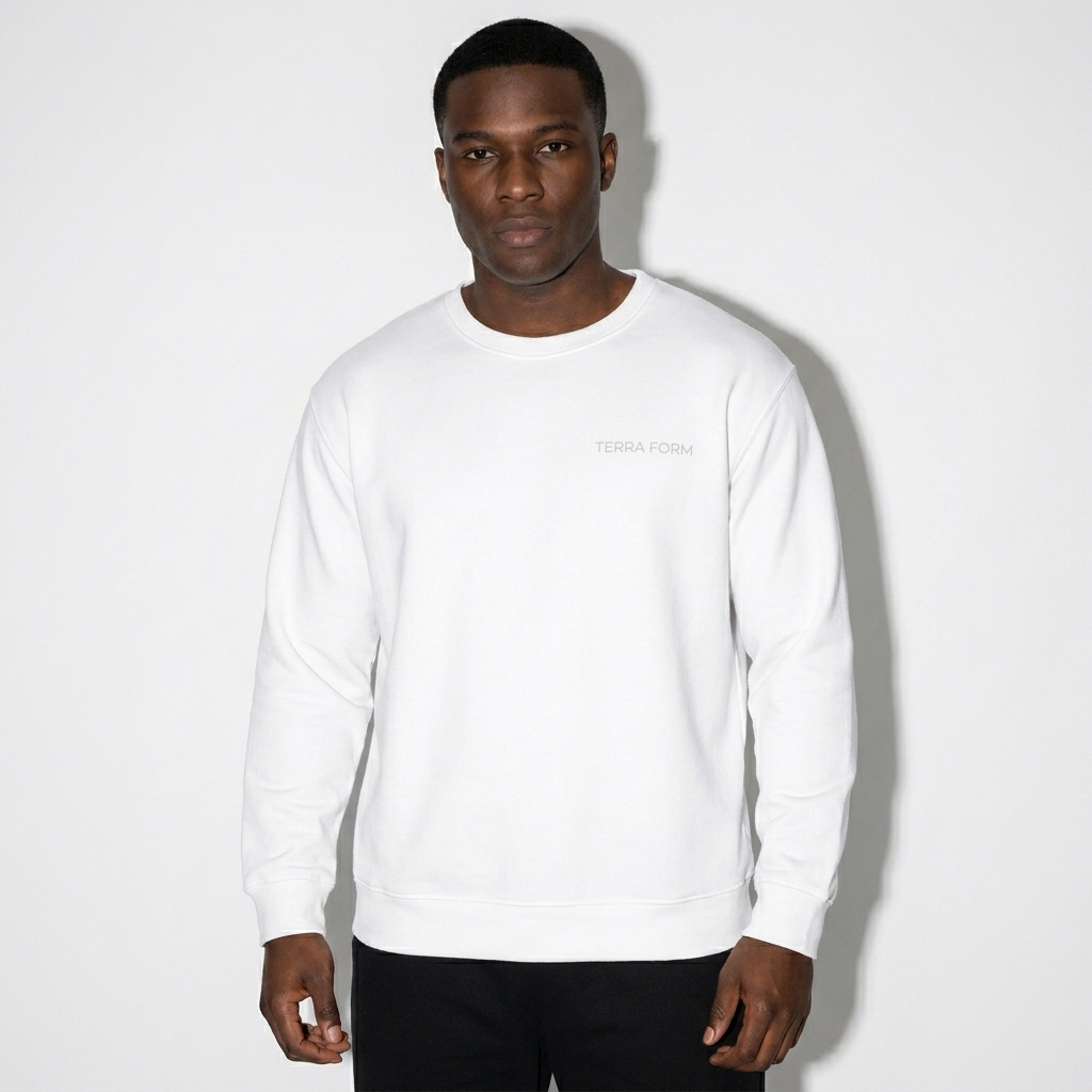 All-Over Print Recycled Sweatshirt worn by a mid-size Black male fashion influencer, editorial avant-garde styling, studio lookbook — custom all-over print recycled sweatshirt