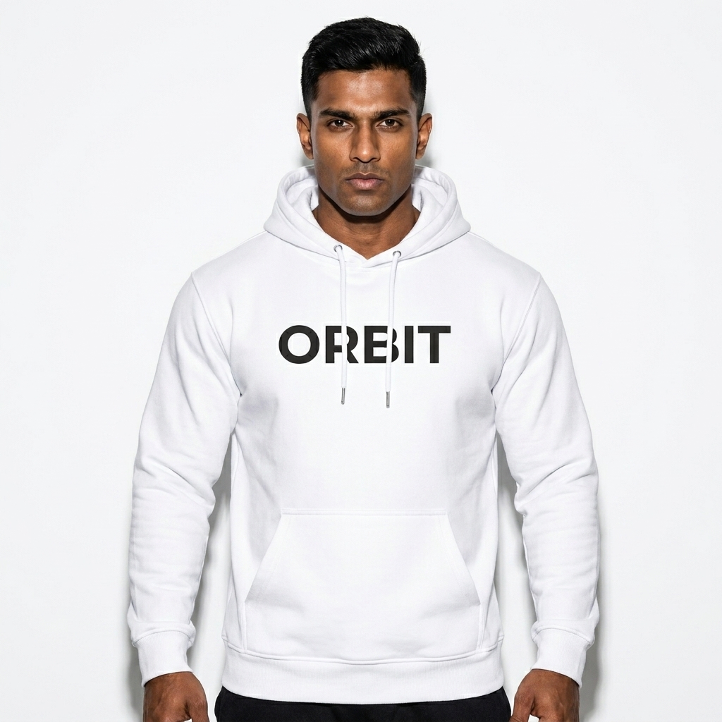 All-Over Print Recycled Unisex Hoodie worn by a athletic muscular Indian male fashion influencer, clean-girl minimal styling, studio lookbook — custom all-over print recycled unisex hoodie