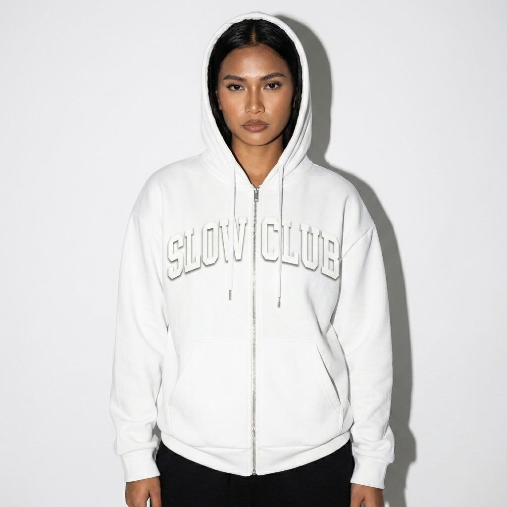 All-Over Print Recycled Zip Hoodie worn by a broad-shouldered Southeast Asian female fashion influencer, techwear modern styling, studio lookbook — custom all-over print recycled zip hoodie