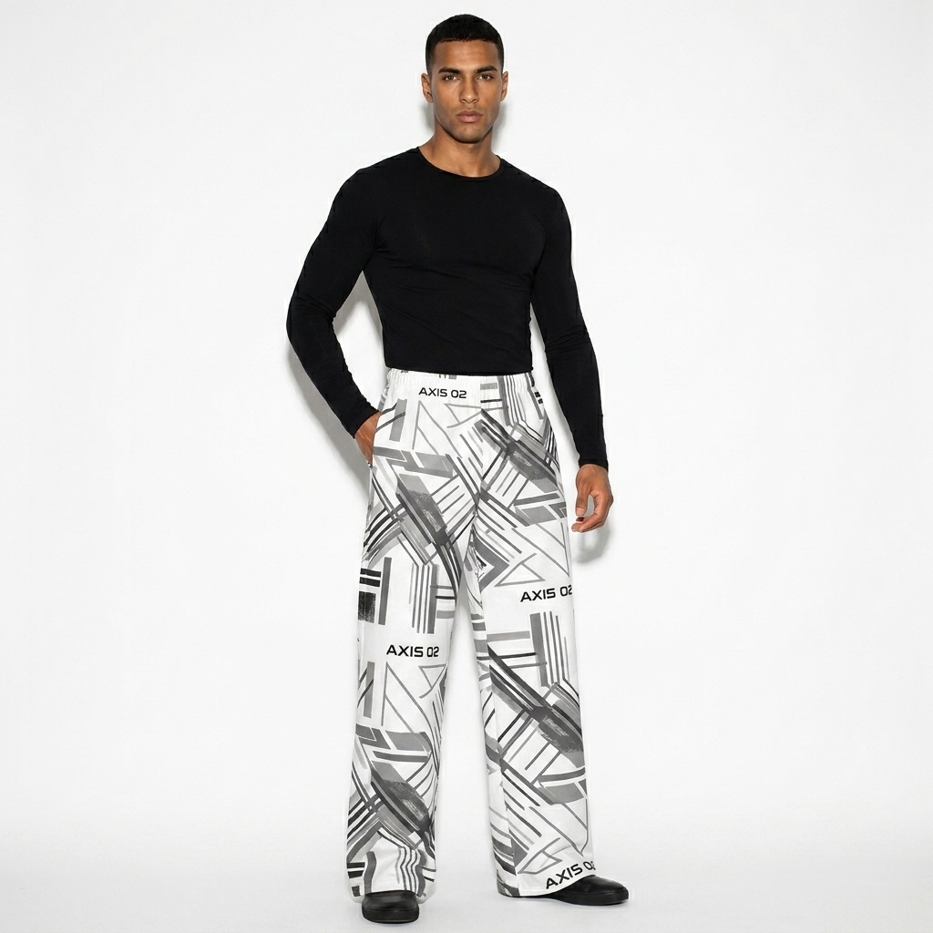 All-Over Print Wide-Leg Pants worn by a toned North African male fashion influencer, minimalist luxury styling, studio lookbook — custom all-over print wide-leg pants