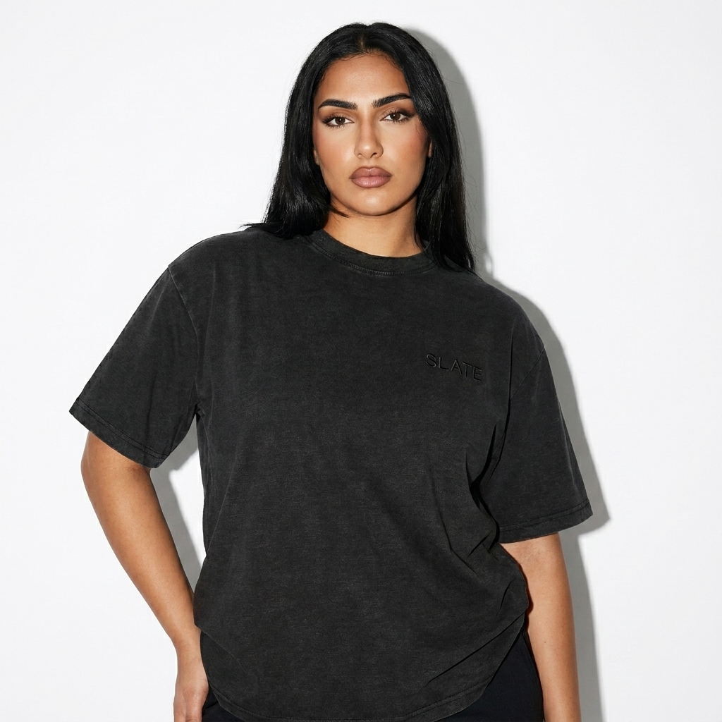 Bamboo Slub Snow Washed T-Shirt worn by a broad-shouldered Arab female fashion influencer, clean-girl minimal styling, studio lookbook — custom bamboo slub snow washed t-shirt
