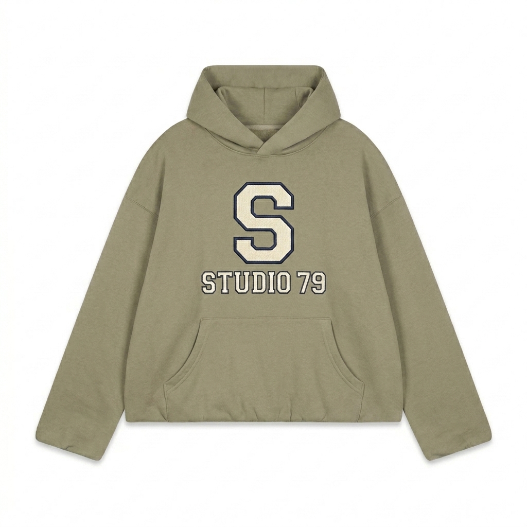 Custom Boxy Gather-Hem Hoodie design direction 3: Retro Collegiate Emblem featuring the STUDIO 79 wordmark