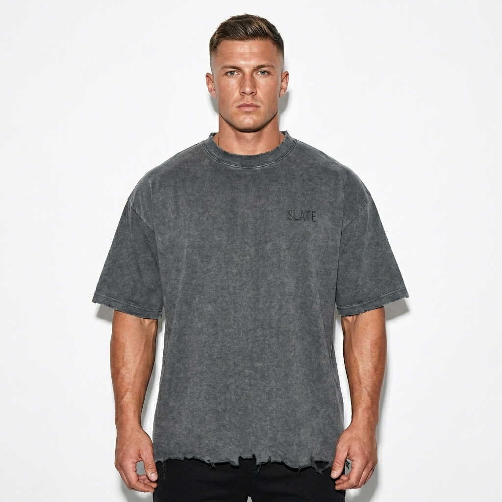 Boxy Heavyweight T-Shirt worn by a athletic muscular British male fashion influencer, preppy ivy styling, studio lookbook — custom boxy heavyweight t-shirt