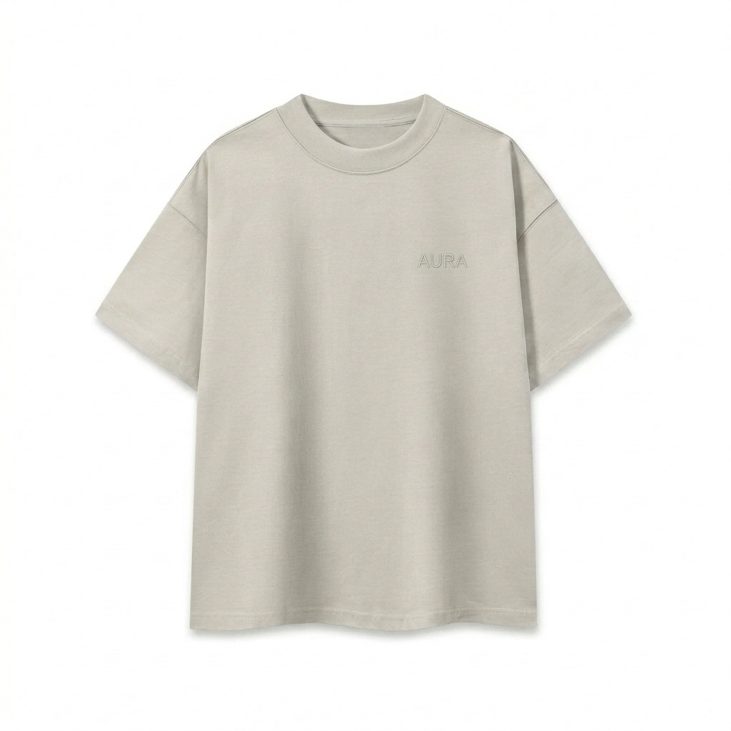 Custom Boxy Oversized T-Shirt design direction 1: Tonal Left Chest Wordmark featuring the AURA wordmark