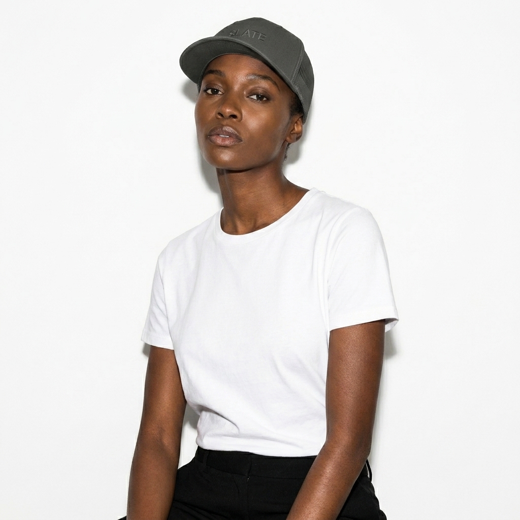 Classic Mesh Back Trucker Cap worn by a lean Black female fashion influencer, downtown streetwear styling, studio lookbook — custom classic mesh back trucker cap