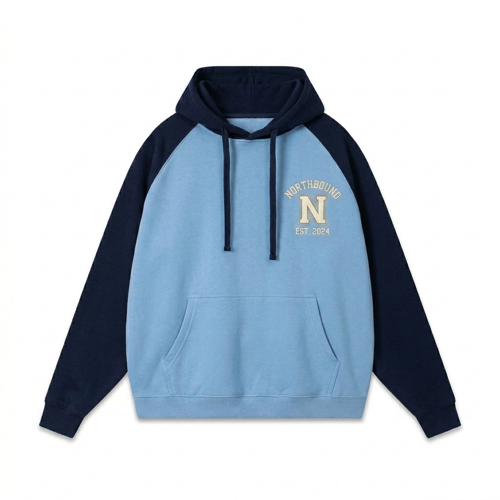 Custom Color-Block Raglan Sleeve Hoodie design direction 3: Varsity Emblem featuring the NORTHBOUND wordmark
