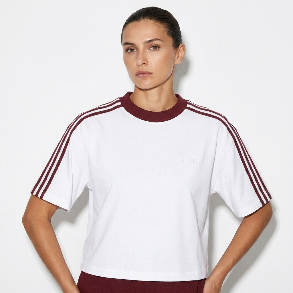 Colorblock Striped T-Shirt worn by a toned Eastern European female fashion influencer, preppy ivy styling, studio lookbook — custom colorblock striped t-shirt