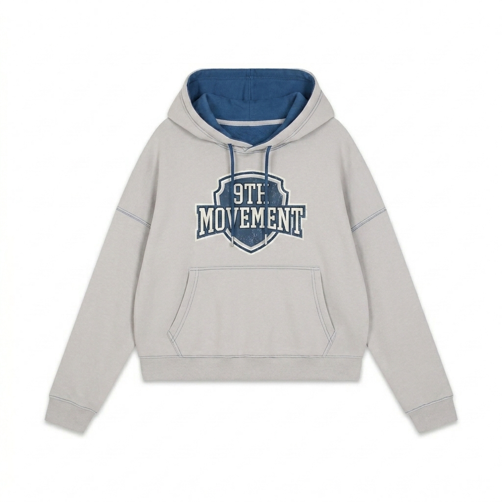 Custom Contrast Drawstring Hoodie design direction 3: Retro Collegiate Emblem featuring the 9TH MOVEMENT wordmark