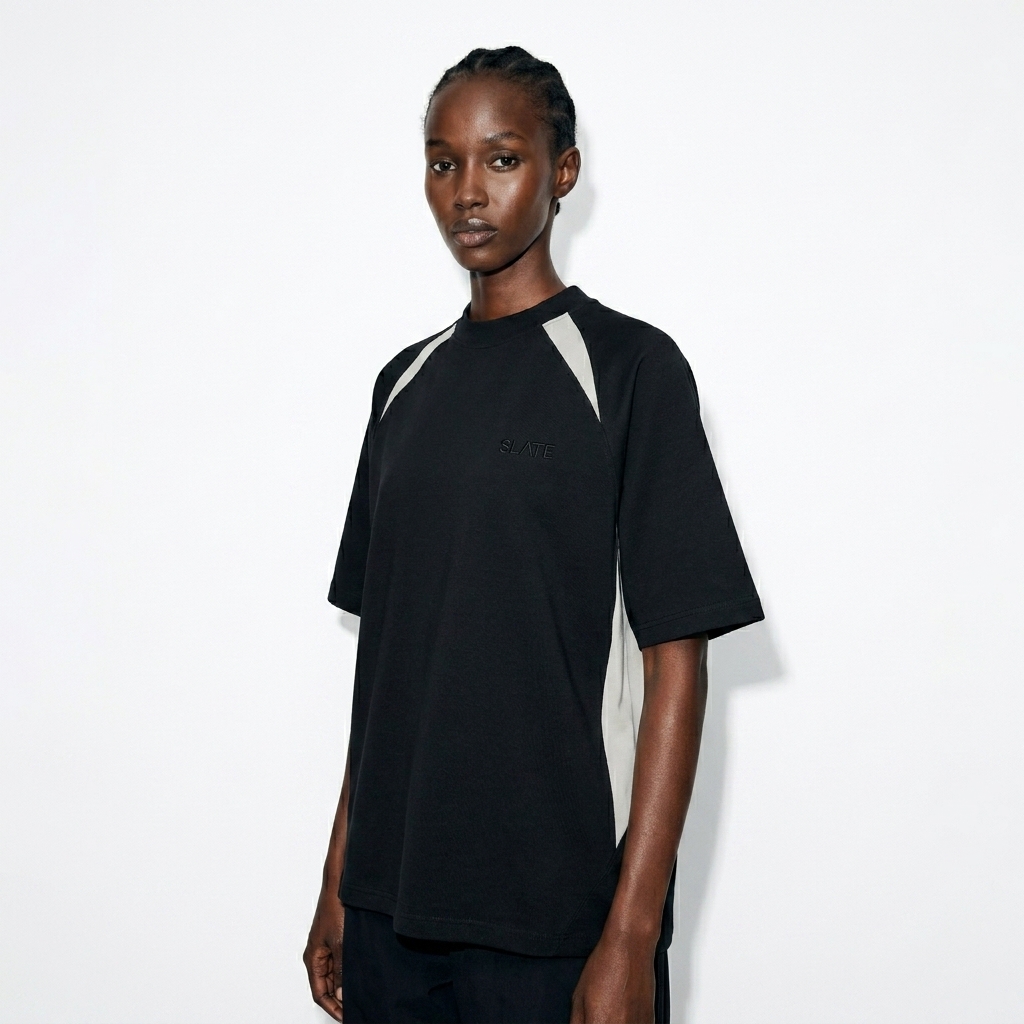 Contrast Panel Performance T-Shirt worn by a slim tall East African female fashion influencer, y2k revival styling, studio lookbook — custom contrast panel performance t-shirt