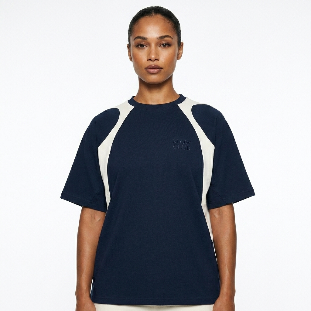 Contrast Panel T-Shirt worn by a toned Mixed-race female fashion influencer, sporty athleisure styling, studio lookbook — custom contrast panel t-shirt