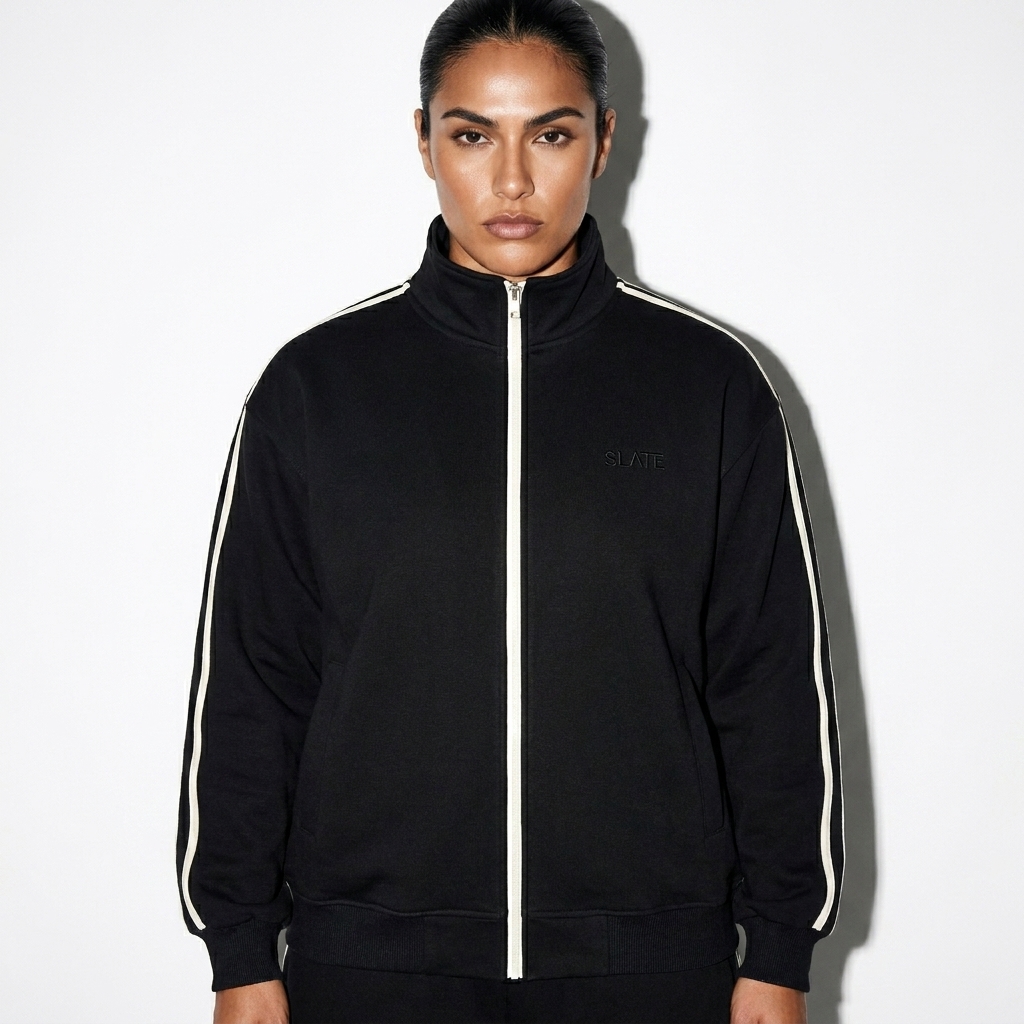 Contrast Side-Stripe Track Jacket worn by a broad-shouldered Hispanic female fashion influencer, clean-girl minimal styling, studio lookbook — custom contrast side-stripe track jacket