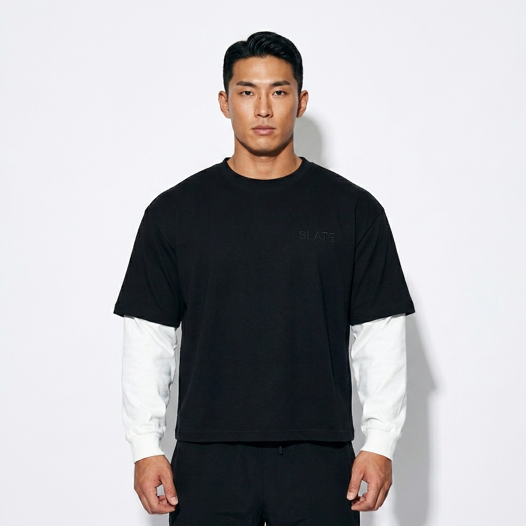 Contrast Sleeve Long Sleeve T-Shirt worn by a athletic muscular Japanese male fashion influencer, editorial avant-garde styling, studio lookbook — custom contrast sleeve long sleeve t-shirt