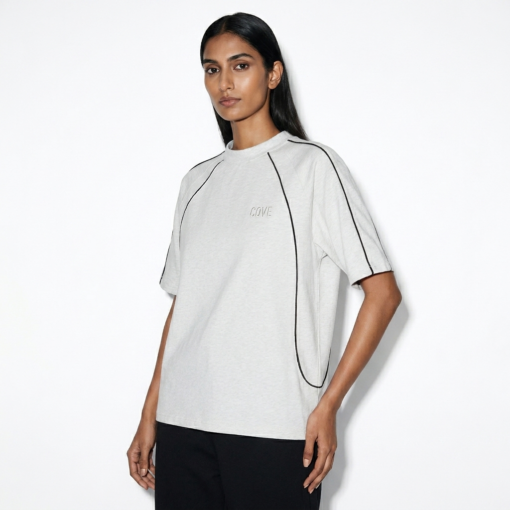 Contrast Stitch Raglan T-Shirt worn by a slim tall Indian female fashion influencer, clean-girl minimal styling, studio lookbook — custom contrast stitch raglan t-shirt