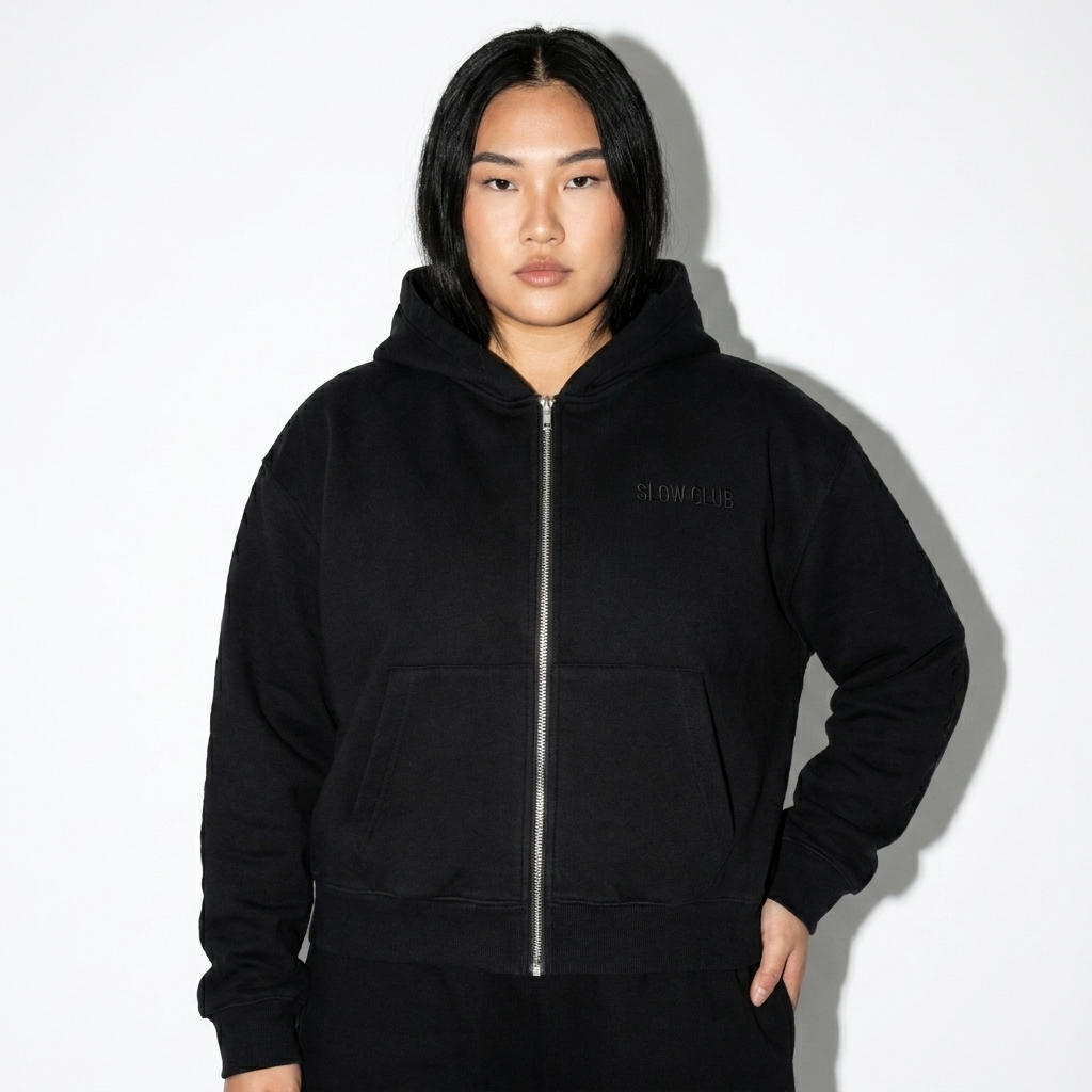 Cropped Fleece Zip-Up Hoodie worn by a broad-shouldered East Asian female fashion influencer, techwear modern styling, studio lookbook — custom cropped fleece zip-up hoodie