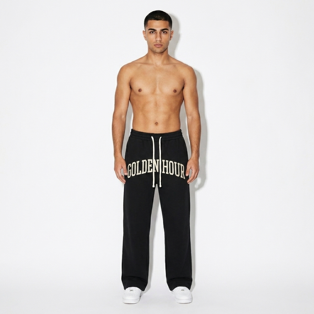 Curved Stripe Sweatpants worn by a petite Persian male fashion influencer, sporty athleisure styling, studio lookbook — custom curved stripe sweatpants