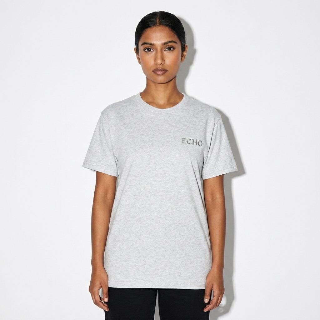 Unisex Classic T-Shirt worn by a petite South Asian female fashion influencer, minimalist luxury styling, studio lookbook — custom unisex classic t-shirt