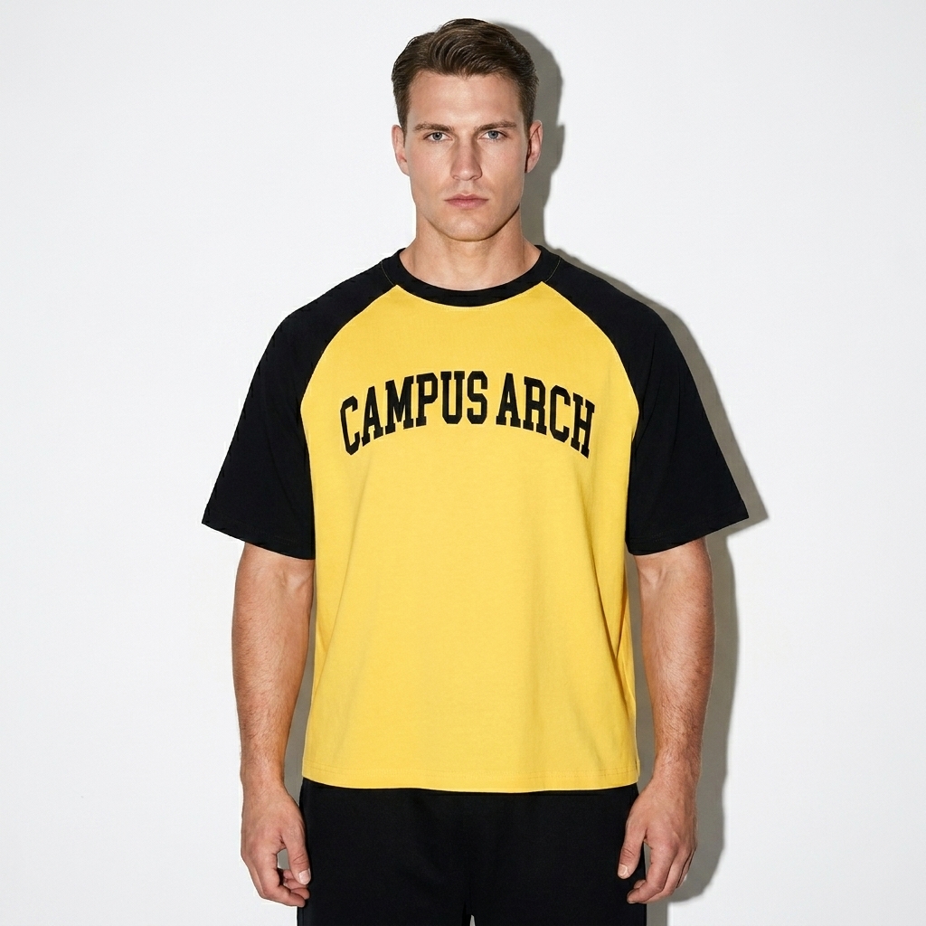 Color-Blocked Raglan T-Shirt worn by a broad-shouldered German male fashion influencer, preppy ivy styling, studio lookbook — custom color-blocked raglan t-shirt