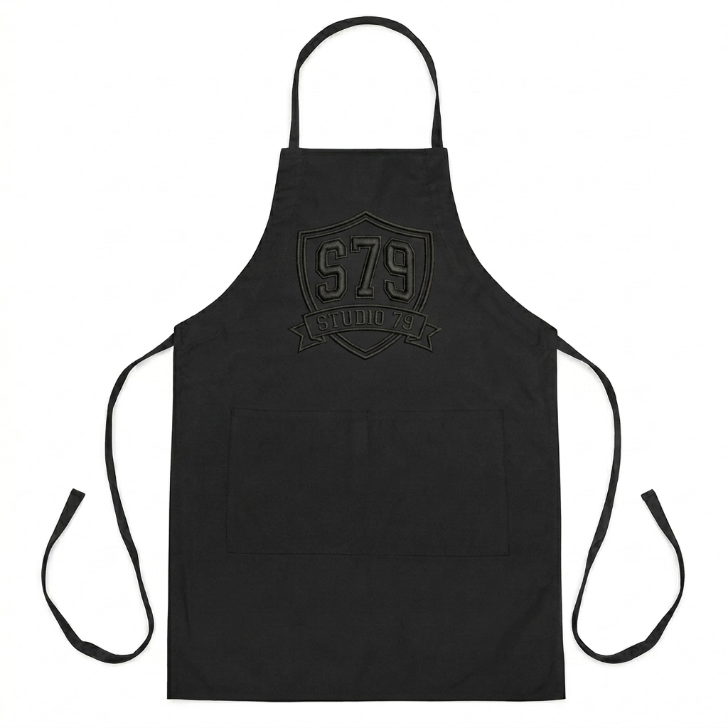 Custom Embroidered Kitchen Apron design direction 3: Retro Collegiate Emblem featuring the STUDIO 79 wordmark