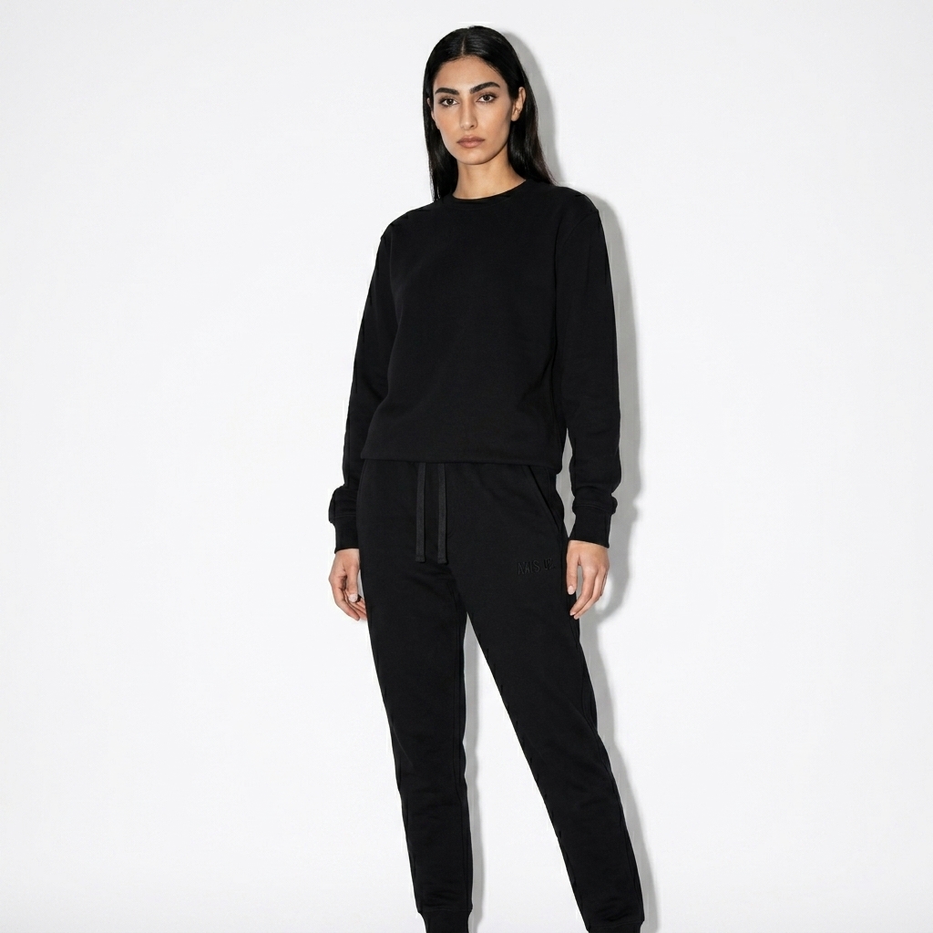 Unisex Fleece Sweatpants worn by a slim tall Persian female fashion influencer, editorial avant-garde styling, studio lookbook — custom unisex fleece sweatpants