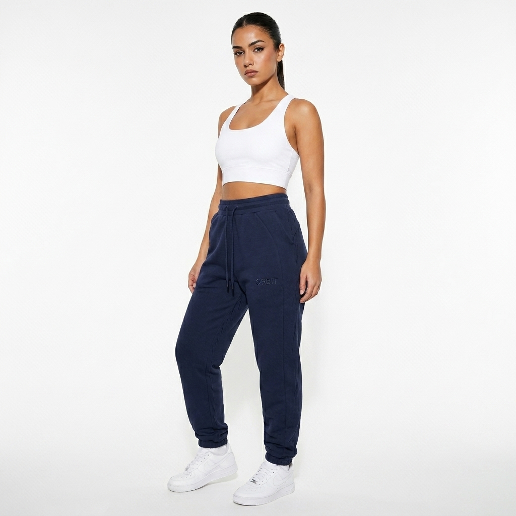 Custom Jogger Pants worn by a petite Turkish female fashion influencer, y2k revival styling, studio lookbook — custom custom jogger pants