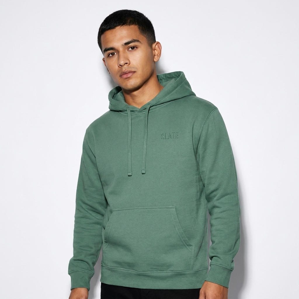 Custom Midweight Hoodie worn by a petite Hispanic male fashion influencer, workwear utility styling, studio lookbook — custom custom midweight hoodie