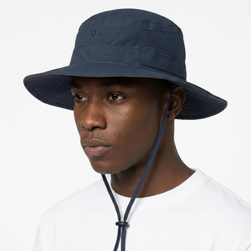 Outdoor Booney Hat worn by a petite Black male fashion influencer, downtown streetwear styling, studio lookbook — custom outdoor booney hat