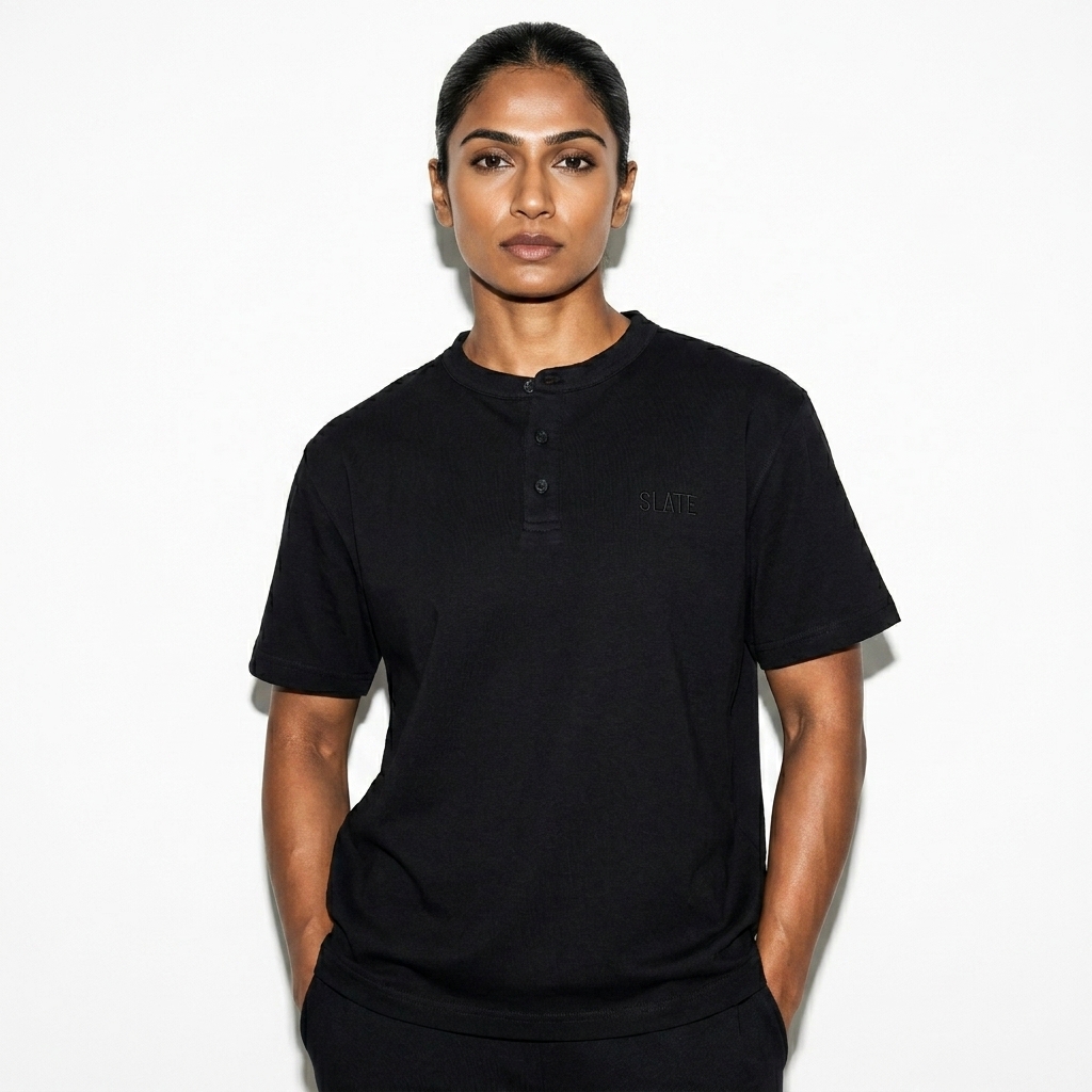 Short Sleeve Henley Shirt worn by a athletic muscular Indian female fashion influencer, minimalist luxury styling, studio lookbook — custom short sleeve henley shirt
