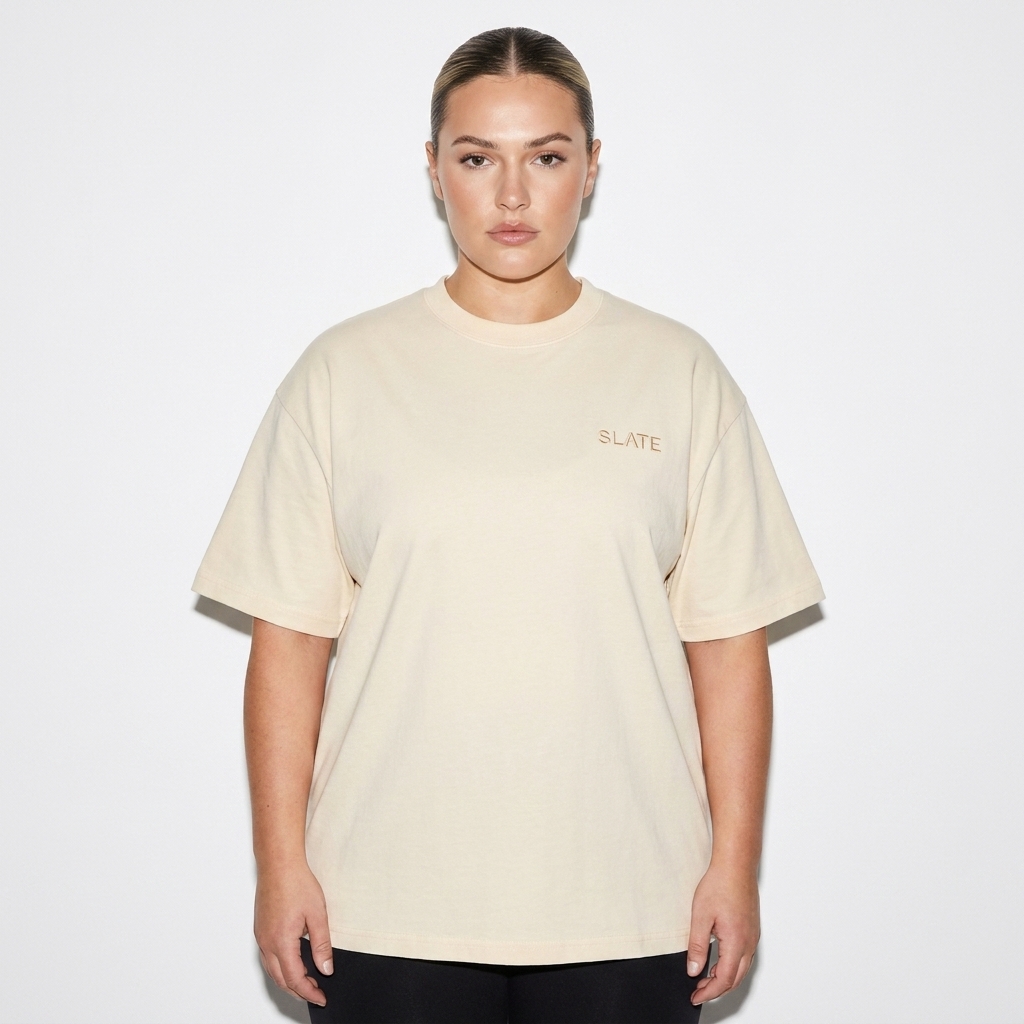 Custom Splatter T-Shirt worn by a broad-shouldered British female fashion influencer, downtown streetwear styling, studio lookbook — custom custom splatter t-shirt