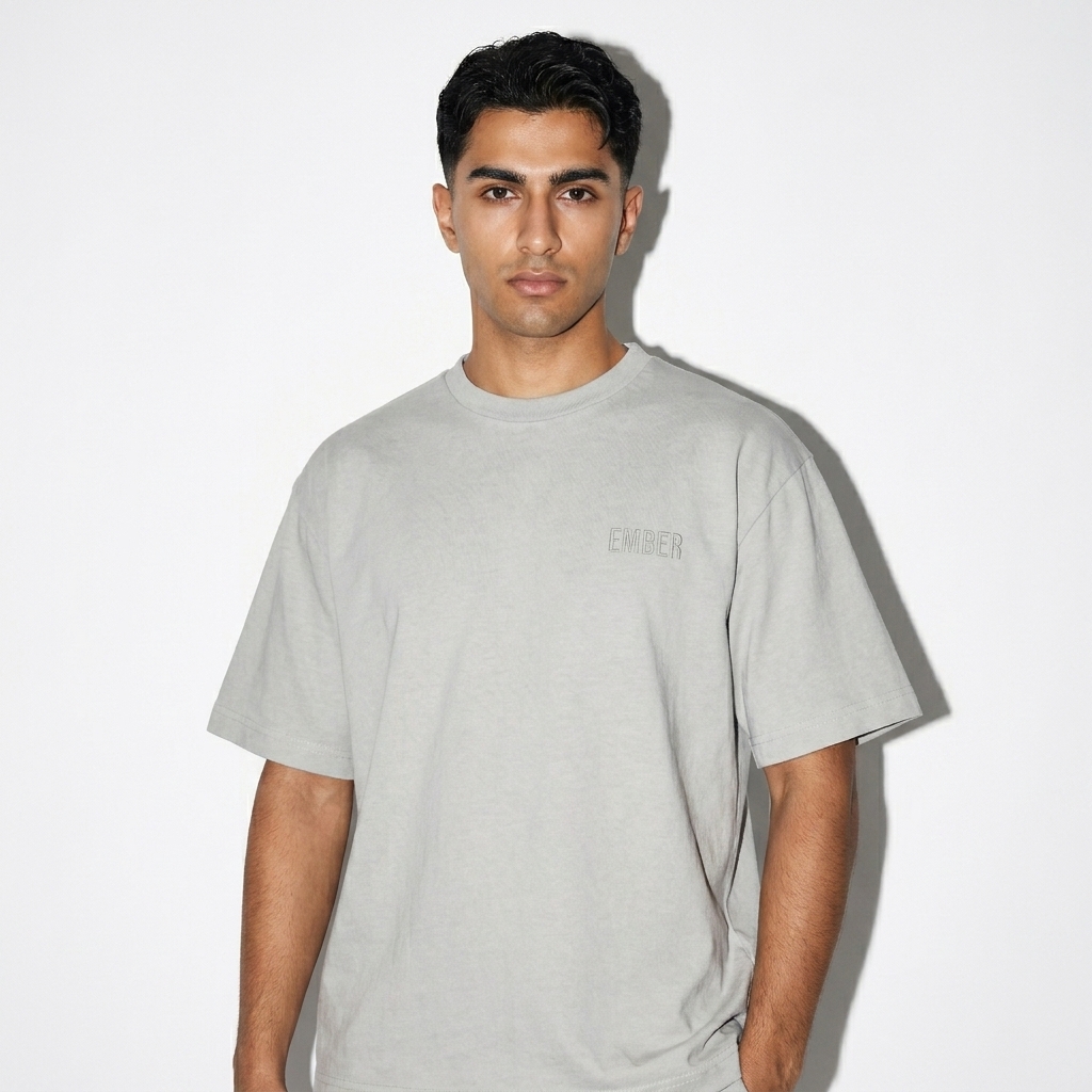 Custom Sun Fade T-Shirt worn by a petite Persian male fashion influencer, downtown streetwear styling, studio lookbook — custom custom sun fade t-shirt