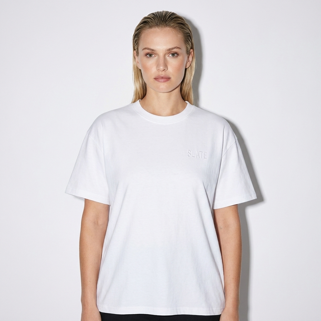 Custom Unisex Crewneck T-Shirt worn by a broad-shouldered White European female fashion influencer, y2k revival styling, studio lookbook — custom custom unisex crewneck t-shirt