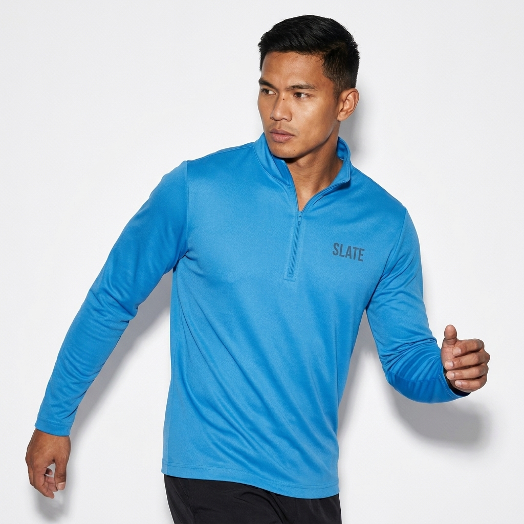 Unisex Quarter Zip Pullover worn by a athletic muscular Filipino male fashion influencer, workwear utility styling, studio lookbook — custom unisex quarter zip pullover