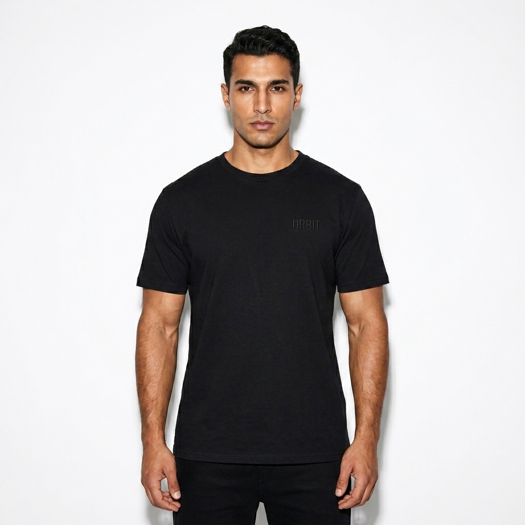 Youth Staple Tee worn by a athletic muscular Turkish male fashion influencer, sporty athleisure styling, studio lookbook — custom youth staple tee