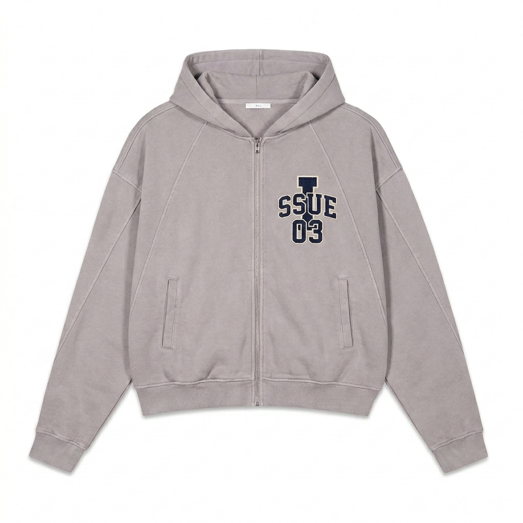 Custom Dirty Washed Zip-Up Hoodie design direction 3: Retro Collegiate Emblem featuring the ISSUE 03 wordmark