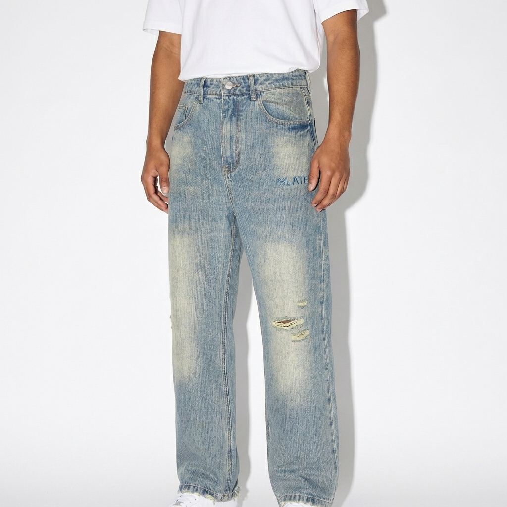 Distressed Vintage Wash Denim Jeans worn by a petite Mixed-race male fashion influencer, preppy ivy styling, studio lookbook — custom distressed vintage wash denim jeans