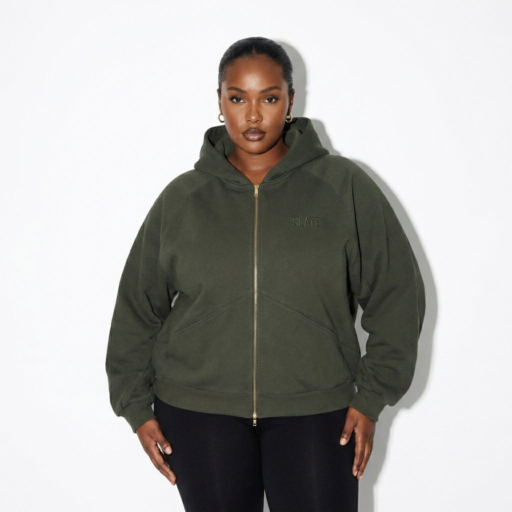 Dolman Sleeve Zip-Through Hoodie worn by a curvy East African female fashion influencer, preppy ivy styling, studio lookbook — custom dolman sleeve zip-through hoodie