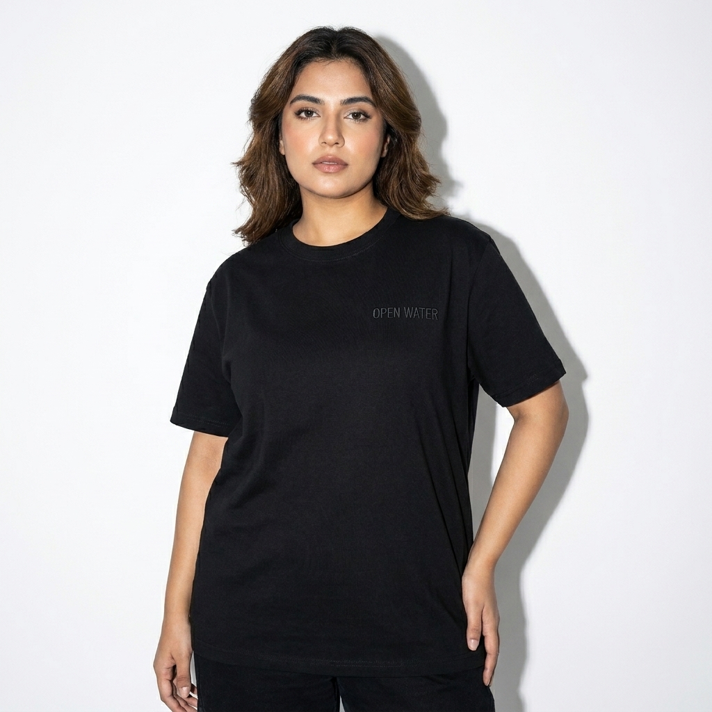 Essential Cotton T-Shirt worn by a mid-size Pakistani female fashion influencer, editorial avant-garde styling, studio lookbook — custom essential cotton t-shirt
