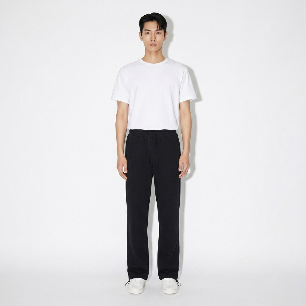 Essential Drawstring Sweatpants worn by a slim tall Korean male fashion influencer, gorpcore outdoor styling, studio lookbook — custom essential drawstring sweatpants