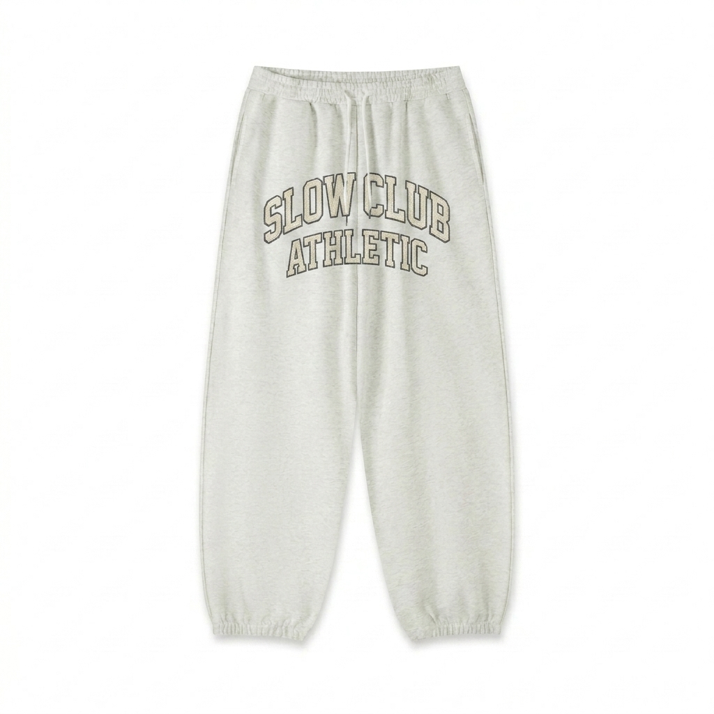 Custom Essential Jogger Sweatpants design direction 3: Retro Collegiate Patch featuring the SLOW CLUB wordmark