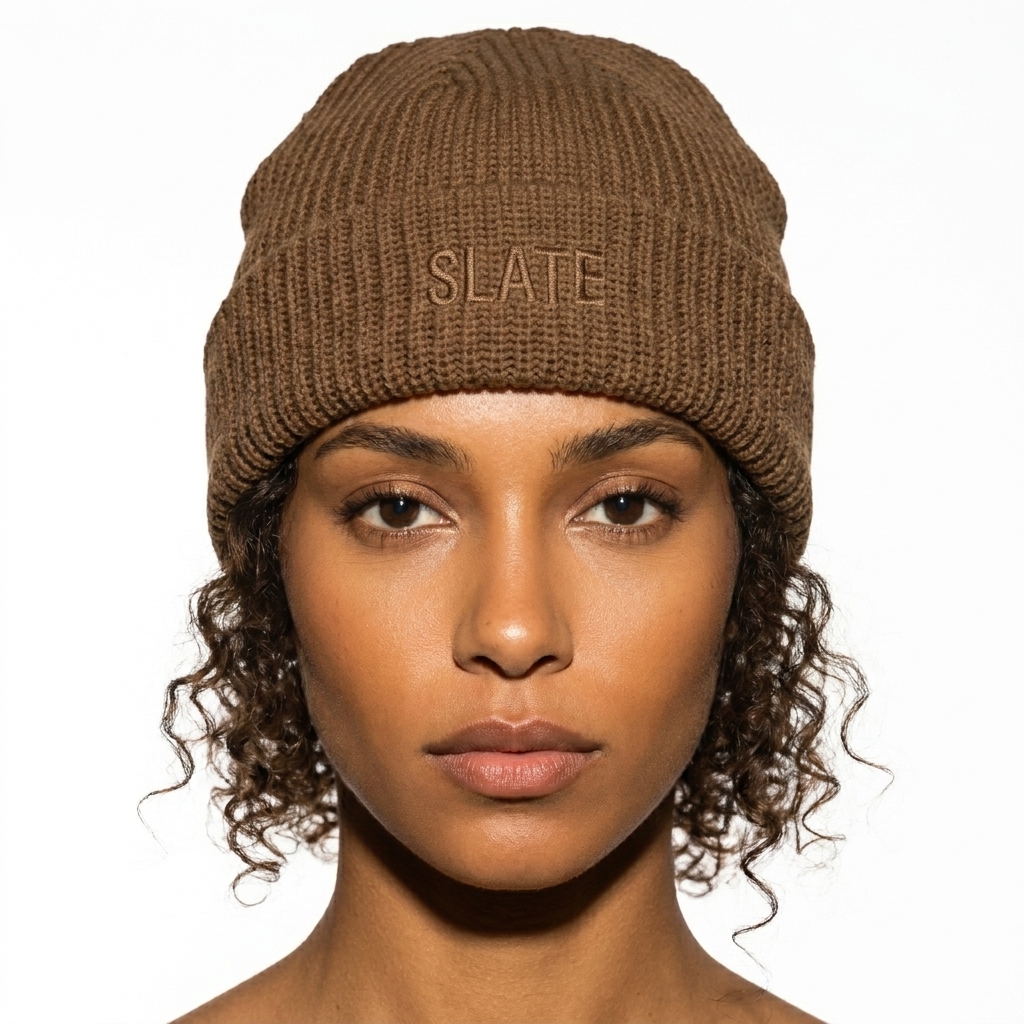 Fisherman Knit Beanie worn by a toned North African female fashion influencer, clean-girl minimal styling, studio lookbook — custom fisherman knit beanie