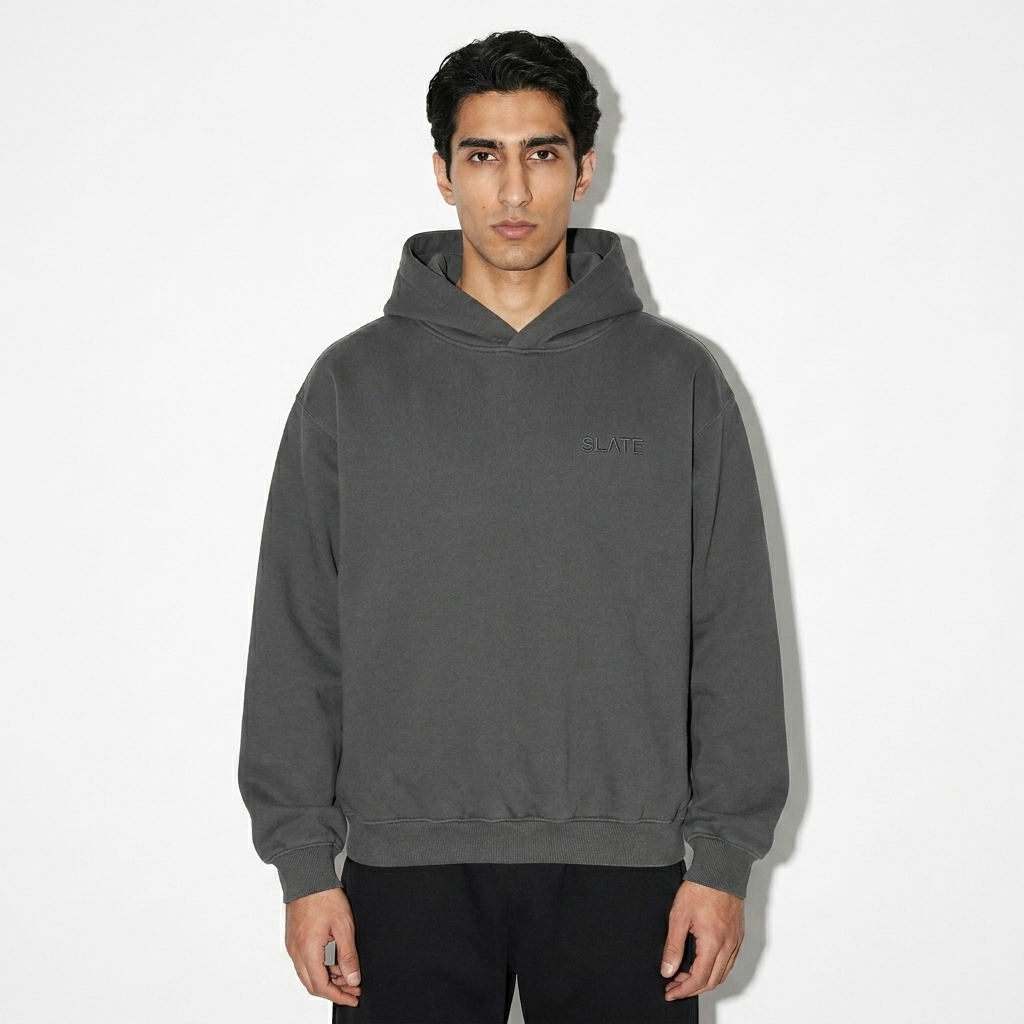 Fleeced Boxy Hoodie worn by a slim tall Persian male fashion influencer, sporty athleisure styling, studio lookbook — custom fleeced boxy hoodie
