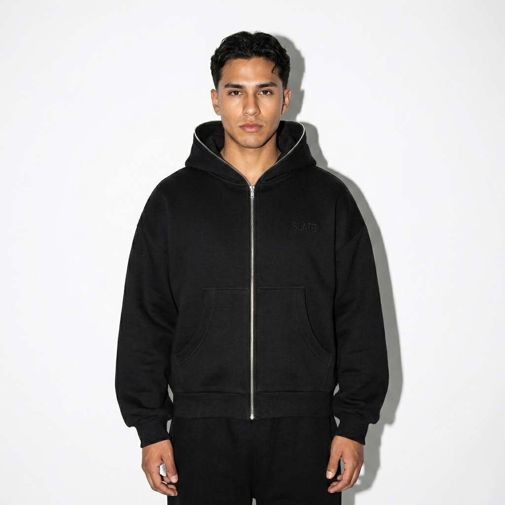 Fleeced Full-Zip Boxy Hoodie worn by a petite Latino male fashion influencer, minimalist luxury styling, studio lookbook — custom fleeced full-zip boxy hoodie