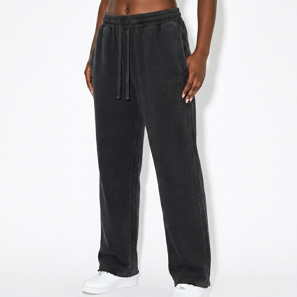 Frayed Enzyme Washed Fleece Sweatpants worn by a mid-size Black female fashion influencer, gorpcore outdoor styling, studio lookbook — custom frayed enzyme washed fleece sweatpants