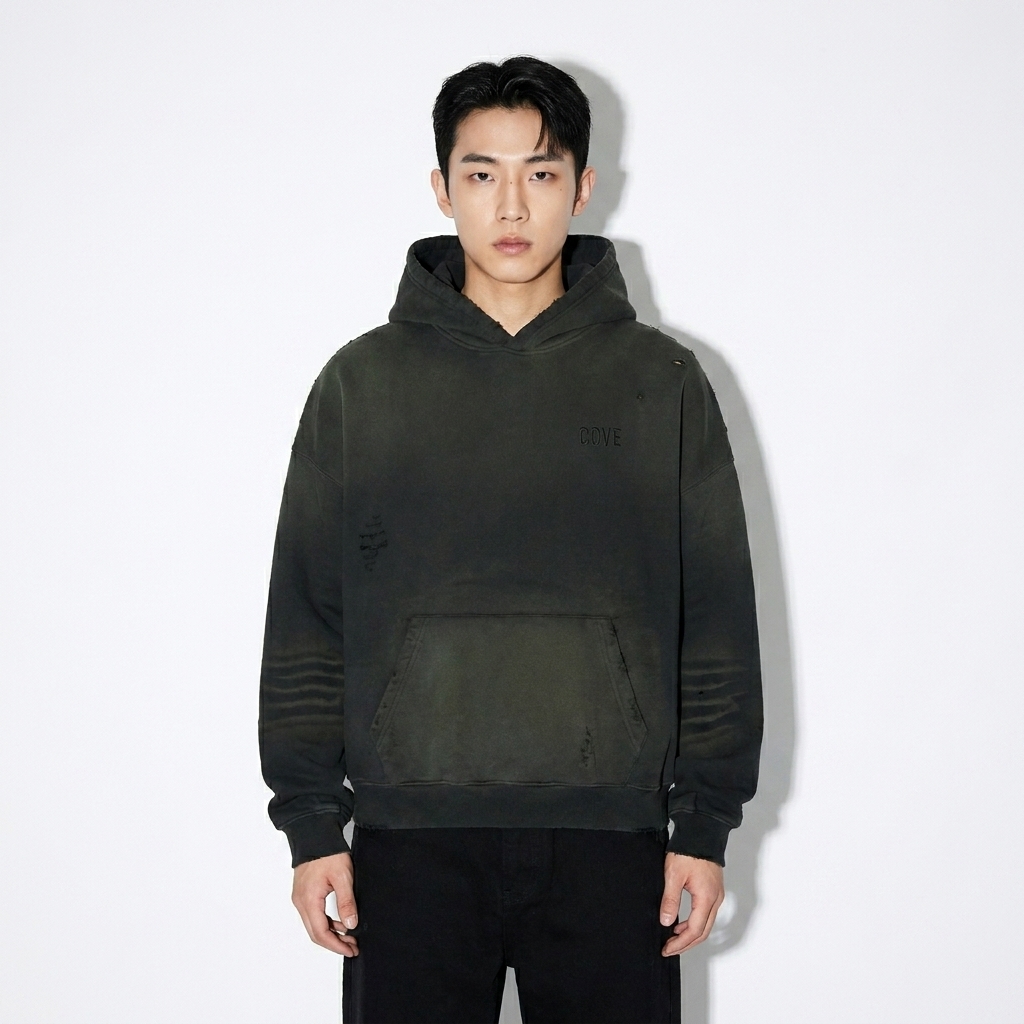 Frayed Sunfade Boxy Hoodie worn by a petite Korean male fashion influencer, editorial avant-garde styling, studio lookbook — custom frayed sunfade boxy hoodie