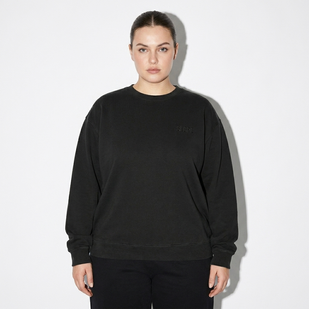 Garment-Dyed Lightweight Fleece Crewneck worn by a curvy White European female fashion influencer, workwear utility styling, studio lookbook — custom garment-dyed lightweight fleece crewneck
