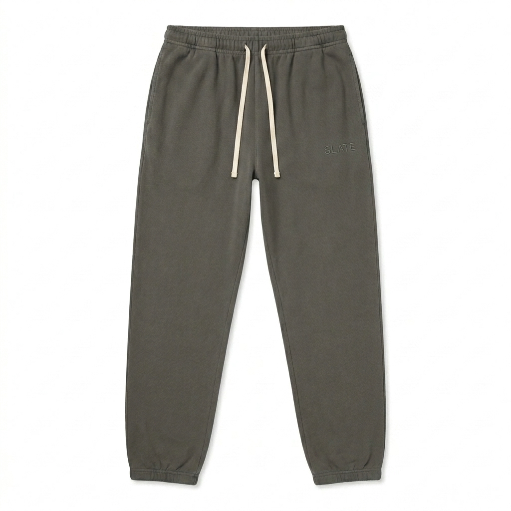 Custom Garment-Dyed Fleece Sweatpants design direction 1: Tonal Minimalist Wordmark featuring the SLATE wordmark